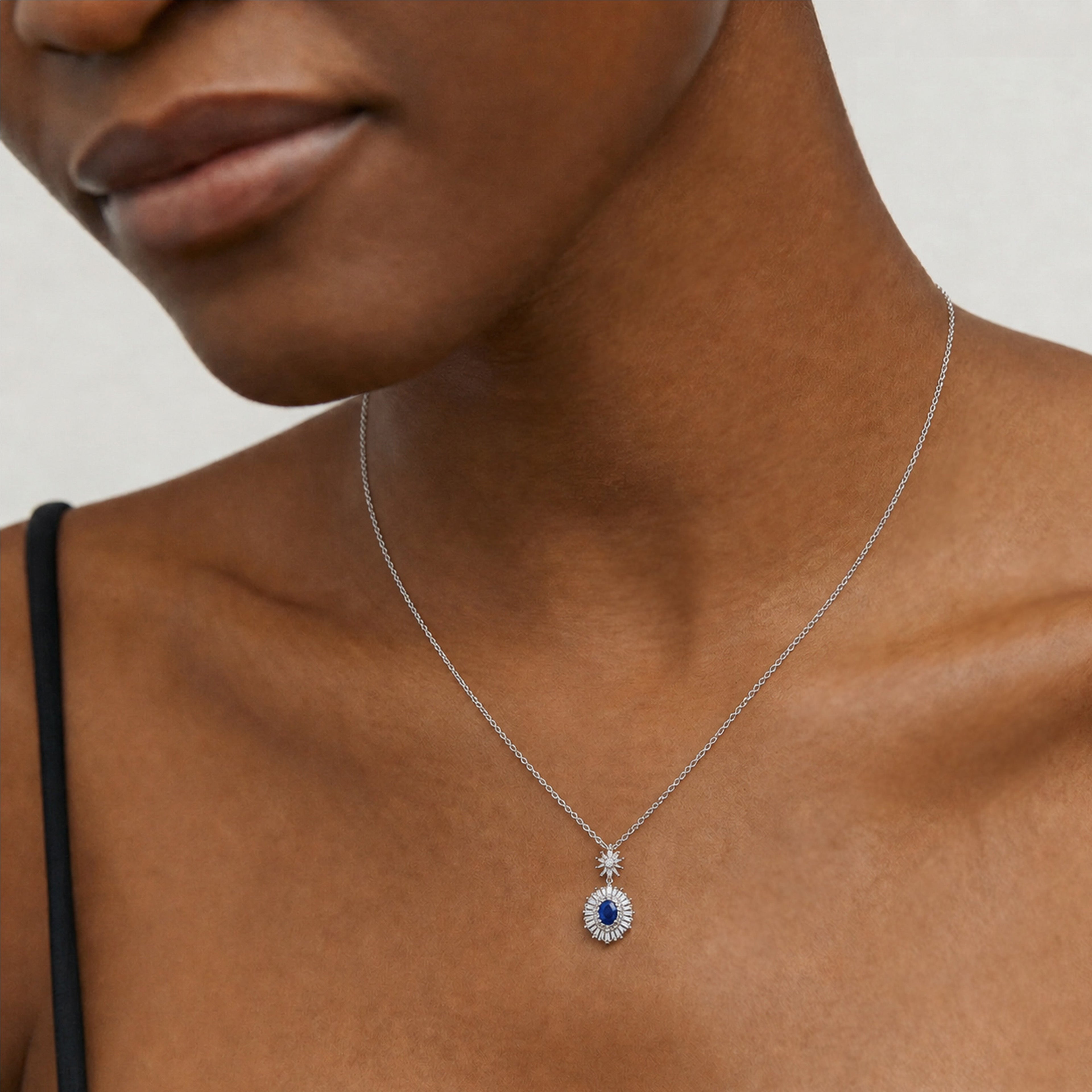 Blue Cubic Zirconia Sunburst Pendant Necklace