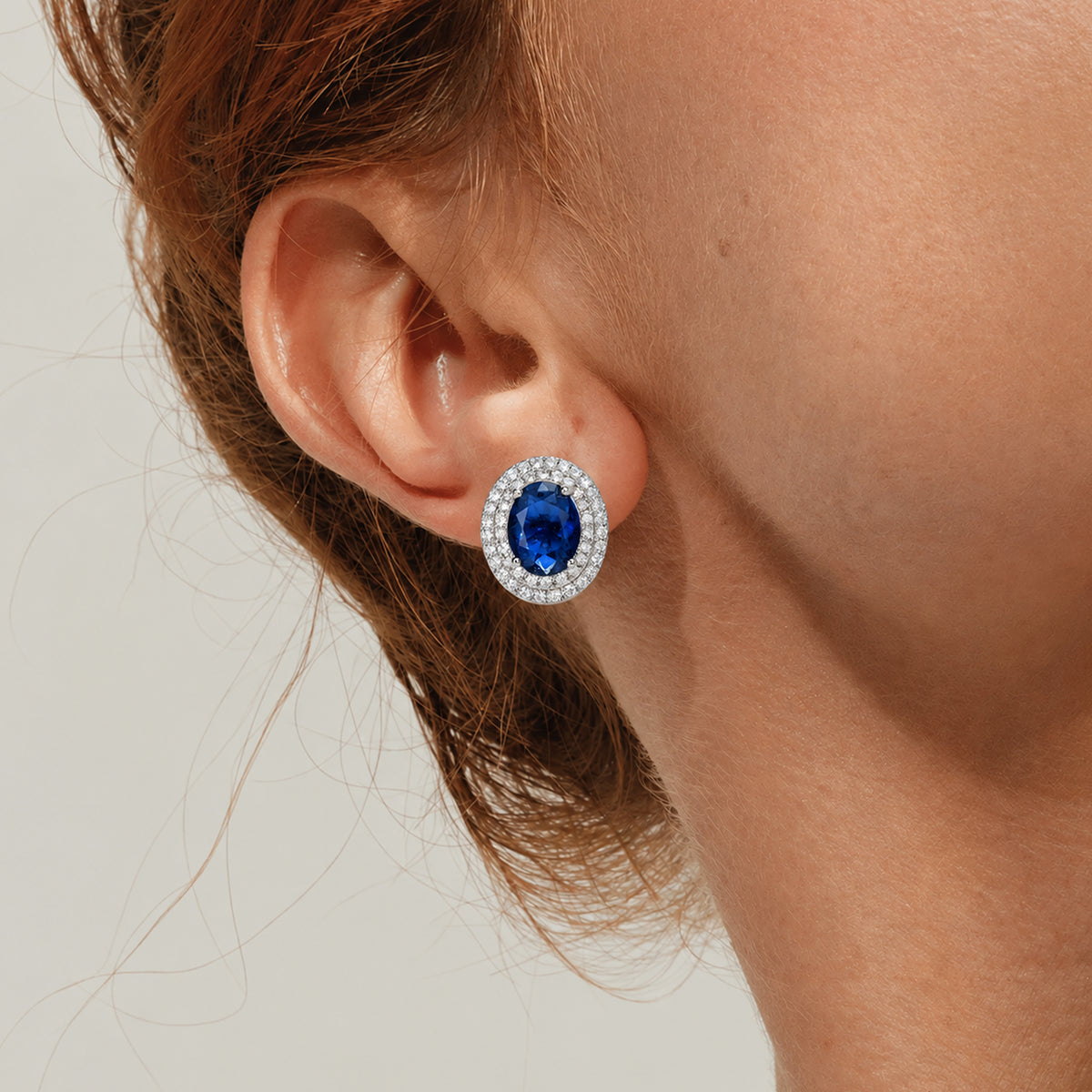 Blue Oval Zirconia Halo Stud Earrings