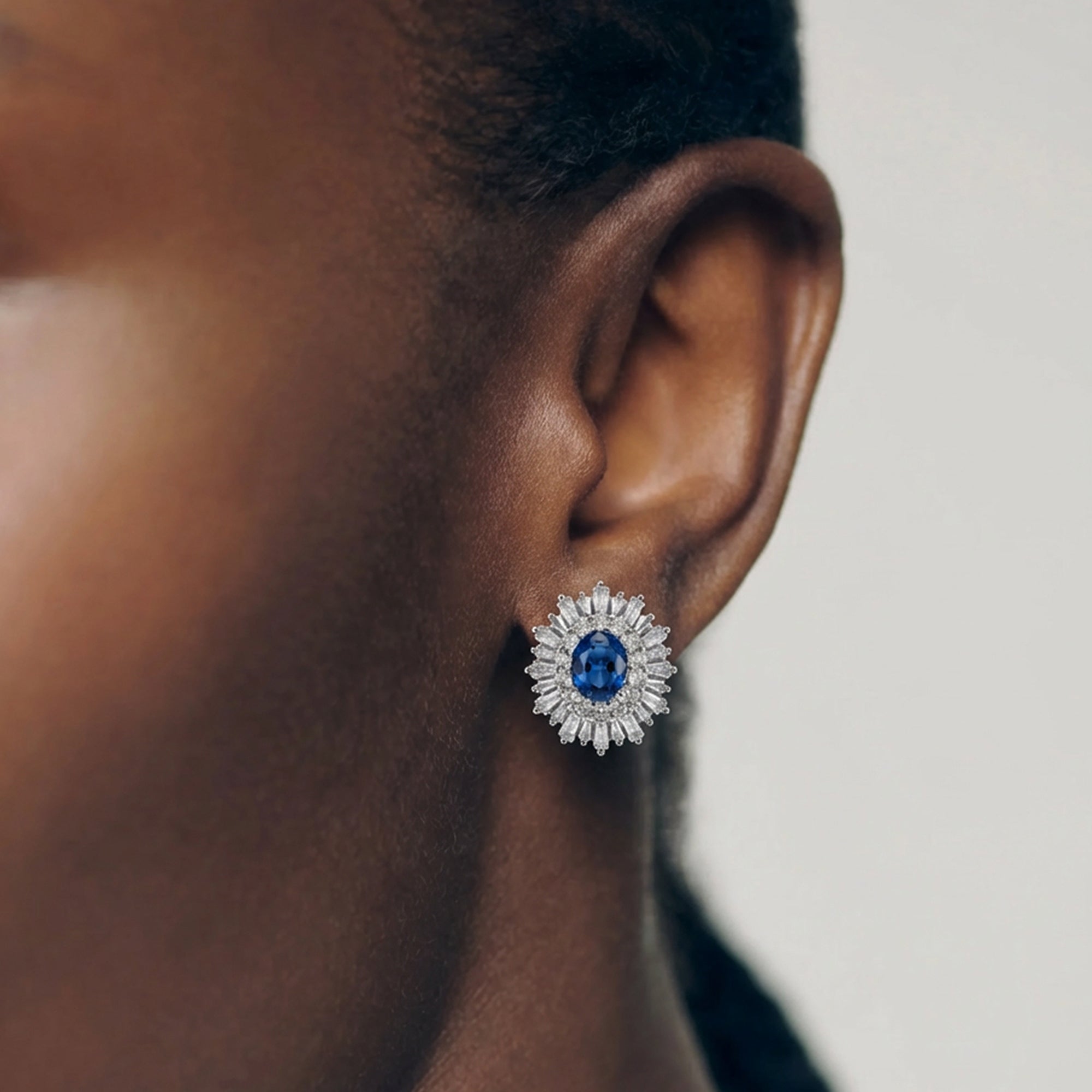 Blue Zirconia Sunburst Stud Earrings