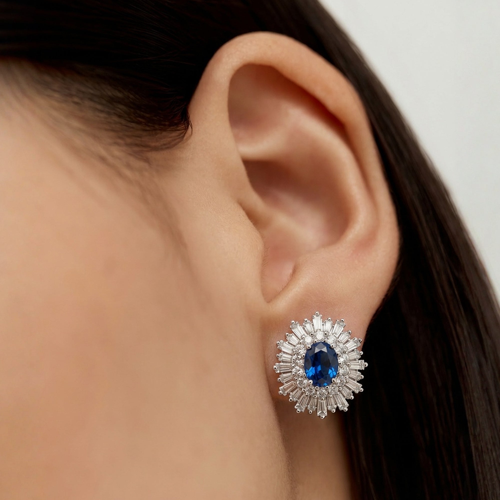 Blue Zirconia Sunburst Stud Earrings